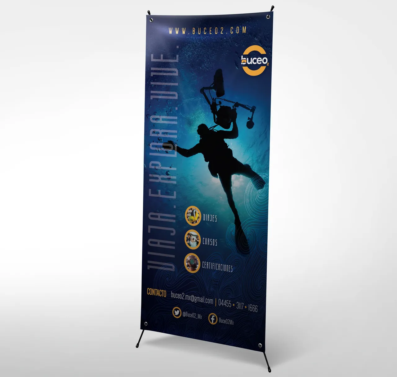 BuceO2 X-banner with a silhouetted diver and the line Viaja, Explora, Vive