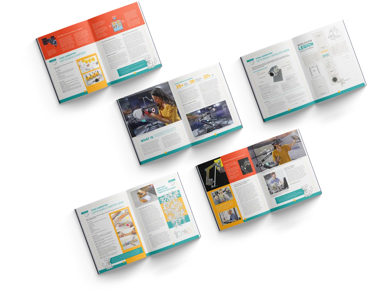 Open spreads of the activity book scattered across an orange surface