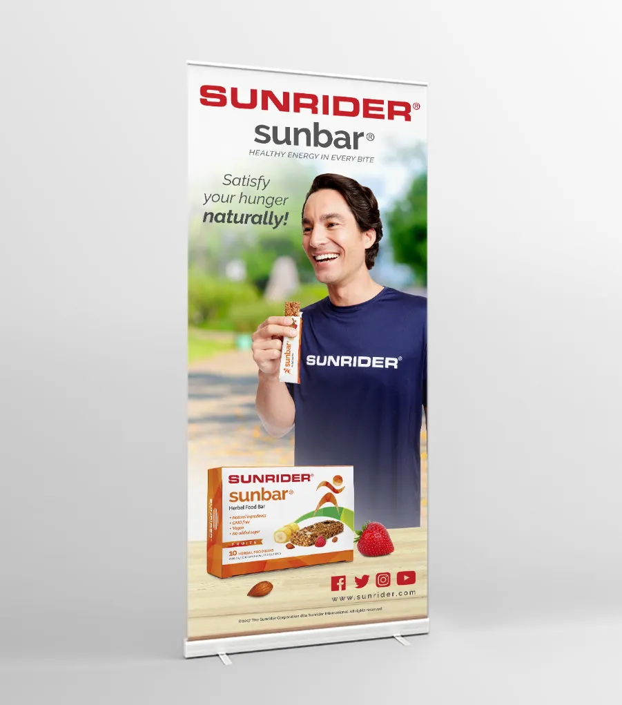 SunBar pull-up banner with a smiling man holding a bar
