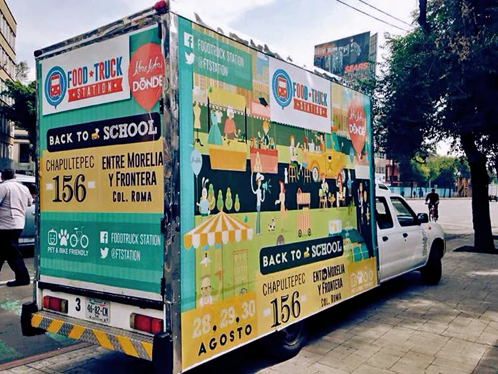 The wrapped truck parked on a Mexico City street
